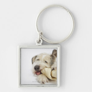 Dog Chewing on Rawhide Bone Keychain