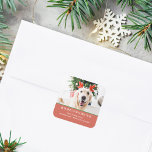 Dog Christmas Photo Happy Pawlidays Address Square Sticker<br><div class="desc">Modern sticker with your favourite photo of your fur baby, "Happy Pawlidays", family name, address in modern serif lettering overlaying festive red background.</div>