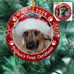 Dog First Christmas Snowflakes 2 Photo Red Ceramic Ornament<br><div class="desc">Create a personalized photo keepsake ornament for a puppy or dog with this festive red and white round ceramic ornament featuring 2 pictures (one on each side), dog pawprints and snowflakes with your custom text (the sample shows Name's First Christmas). The design is duplicated on both sides with the same...</div>