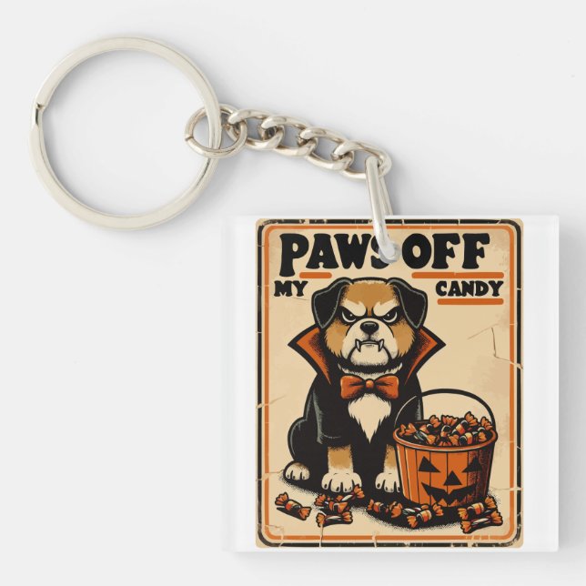 Dog in Vampire Costume Guarding Halloween Candy Keychain (Front)