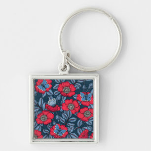 Dog rose and butterflies in blue and red keychain