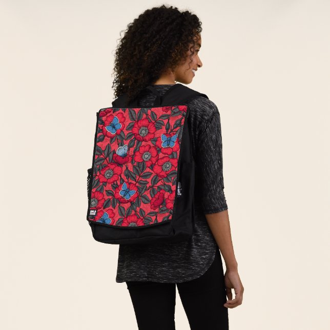 Dog rose and butterflies in red and blue backpack (Worn)