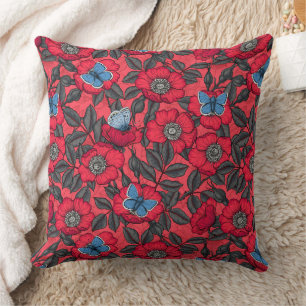 Dog rose and butterflies in red and blue throw pillow
