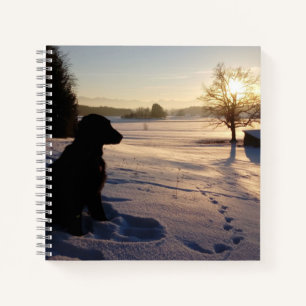 Dog Silhouette in Snowy Landscape Notebook