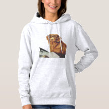 Dog sitting in front of a magazine 