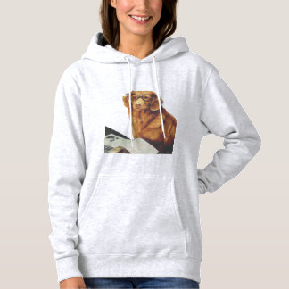 Dog sitting in front of a magazine  hoodie