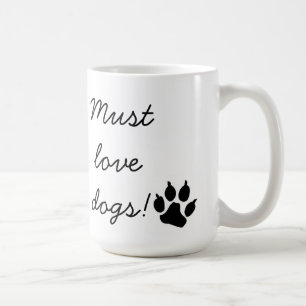 Doit aimer la tasse noire d'empreinte de patte de