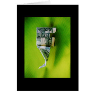 Dollar bill origami Elephant on Green background