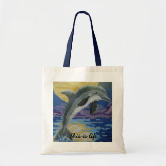 Dolphin at full moon tote bag