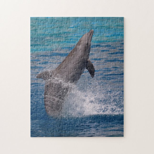 Dolphin standing out of the water jigsaw puzzle (Vertical)
