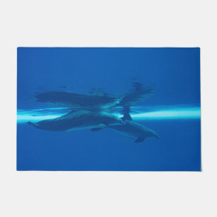Dolphins and reflection, blue ocean doormat