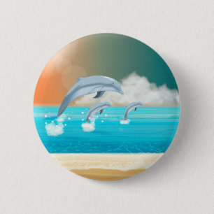 dolphins breaching in the ocean 2 inch round button