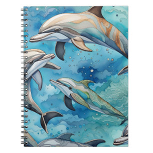 Dolphins swimming in the sea notebook