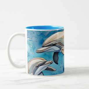 Dolphins swimming in the sea Two-Tone coffee mug