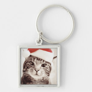 Domestic tabby cat wearing red Christmas hat Keychain