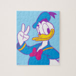 Donald Duck Peace Sign Jigsaw Puzzle<br><div class="desc">Brighten up your wardrobe with this electric and cheerful Donald Duck illustration! Featuring a classic full-body pose with a friendly peace sign, this design gets a stylish update with a vibrant, non-traditional colour palette. The combination of bright cyan, magenta, and sunny yellow gives this artwork a fresh, "neon-pop" aesthetic that...</div>