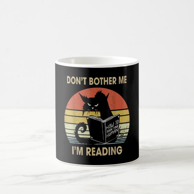 Don't Bother Me I'm Reading Cat Reading Books Magic Mug (Center)
