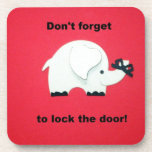 Don't forget to lock the door. coaster<br><div class="desc">Elephant with ribbon tied around it's trunk and message: "Don't forget to lock the door."</div>