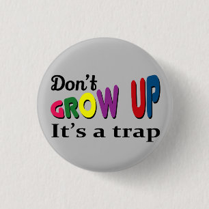 Don't grow up it's a trap 1 inch round button