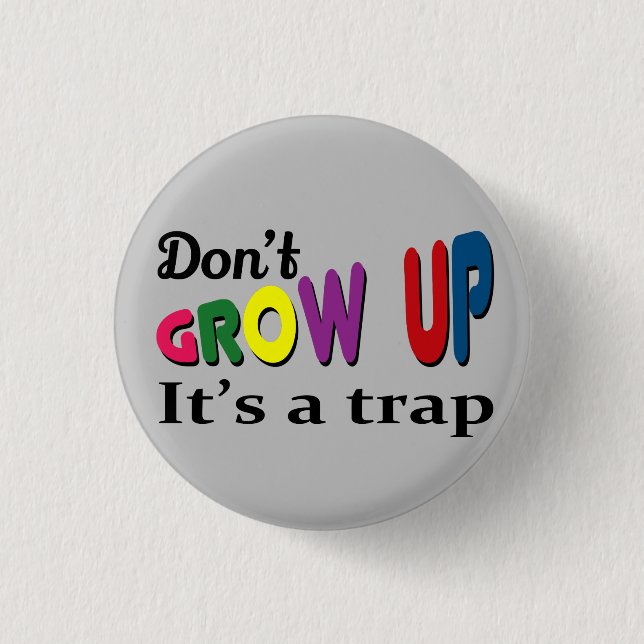 Don't grow up it's a trap 1 inch round button (Front)