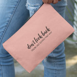 Don't Look Back | Modern Uplifting Peachy Pink Accessory Pouch<br><div class="desc">Simple, stylish “Don’t look back you’re not going that way” custom design with modern script typography on a blush pink background in a minimalist design style inspired by positivity and looking forward. The text can easily be customized to add your own name or custom slogan for the perfect uplifting gift!...</div>