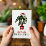Don't Stop Be-leaf-ing Santa Christmas Houseplant  Holiday Card<br><div class="desc">Watercolor illustration of plant in Santa suit pot topped with Santa hat.  Text says,  "Don't stop Be-leaf-ing"</div>