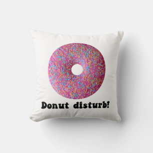 Donut disturb throw pillow