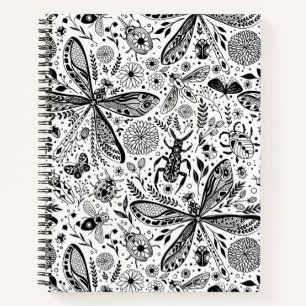 Doodle bugs on dark blue notebook