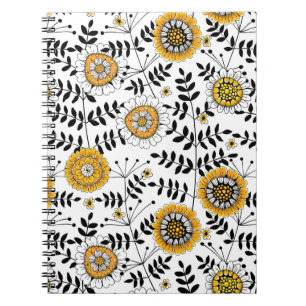 Doodle flowers and leaves in yellow and black notebook