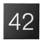 Door number tile<br><div class="desc">Edit the text and get a personalized product with a phrase or your name. In some products you can also upload an image.</div>