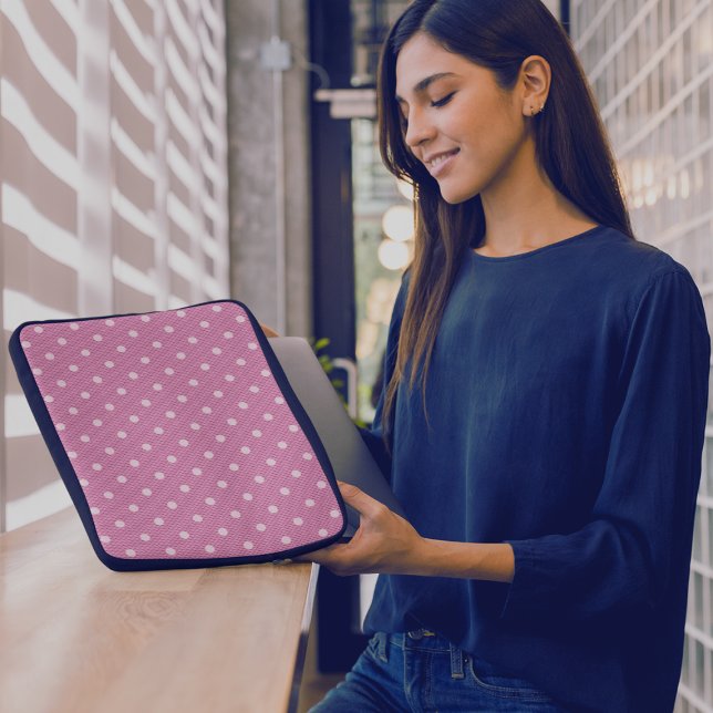  Dotty Delight Pink Laptop Sleeve (A woman tries to put her rap note into a laptop in a Dotty Delight Pink Laptop Sleeve.)