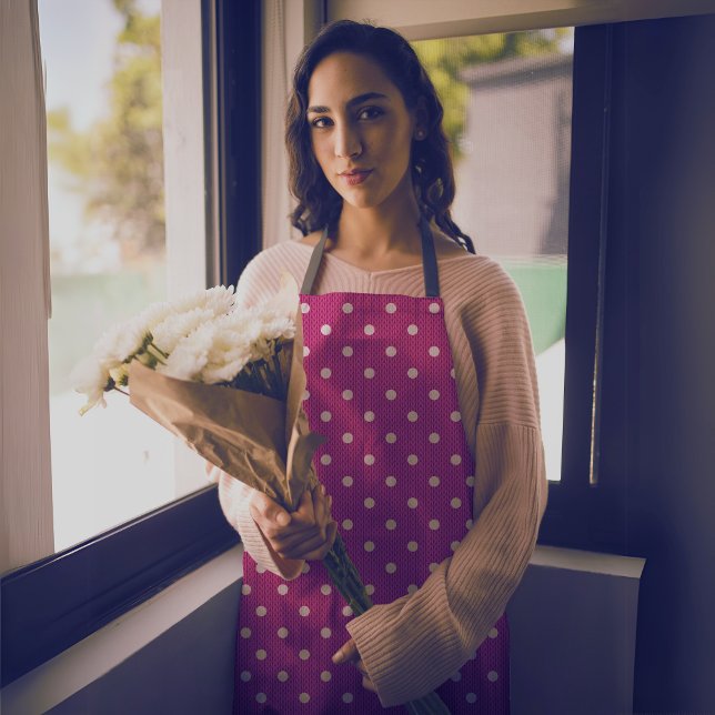 Dotty Delight Red Apron (A woman in a Dotty Delight Red Apron holds a flower is standing. )