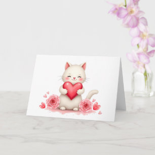 Douce petite chatte blanche avec carte de la Saint