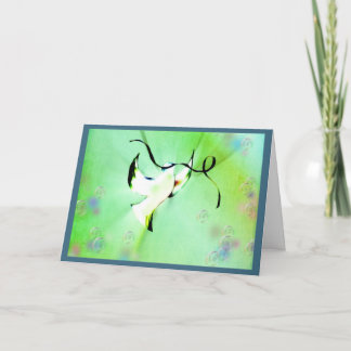 Dove of peace holding a ribbon holiday card