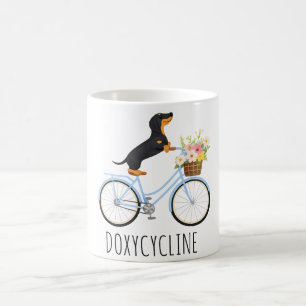 Doxycycline Pharmacy Pun , Dachshund on Bicycle, Coffee Mug