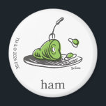 Dr. Seuss | Green Eggs and Ham Magnet<br><div class="desc">This officially licensed Dr. Seuss design features a fun, classic illustration of the iconic green eggs and ham on a platter. The artwork highlights the famous green ham with a fork resting inside, alongside the bouncing green eggs, and is finished with the simple word "ham" and the authentic Dr. Seuss...</div>