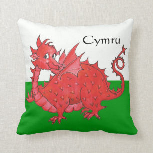 Dragon rouge mignon, coussin vert et blanc ou