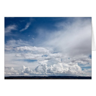 Dramatic clouds in sky over mesa in Abo, NM