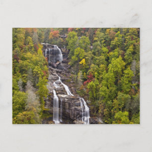 Dramatic Whitewater Falls in autumn in the Postcard