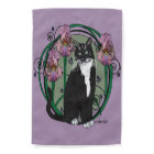 Chat aux cheveux courts noir et blanc avec des