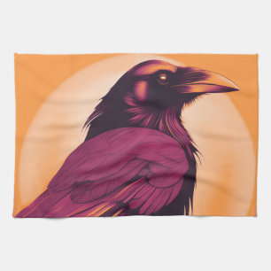 Drawing of a black raven on yellow orange kitchen towel