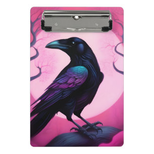 Drawing of a raven on neon pink background mini clipboard
