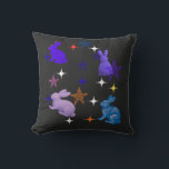 Dreamy Galaxy Bunnies Throw Pillow<br><div class="desc">Step into a dream with this enchanting Celestial Bunny design. Featuring four textured,  painterly rabbits dancing among a constellation of hand-drawn and glowing stars,  this piece captures the magic of a midnight meadow. A perfect choice for rabbit lovers,  stargazers,  and anyone who appreciates an artistic,  whimsical aesthetic.</div>