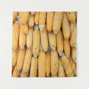 Dried corn that was stacked . tapestry
