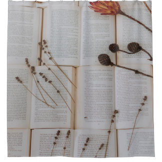 Dried flowers on books