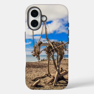 Driftwood artwork on Hokitika Beach, New Zealand iPhone 16 Case