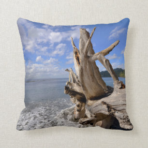 Driftwood On The Shoreline Of French Beach Throw Pillow