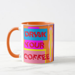 Drink your coffee logo on pink orange blue design mug