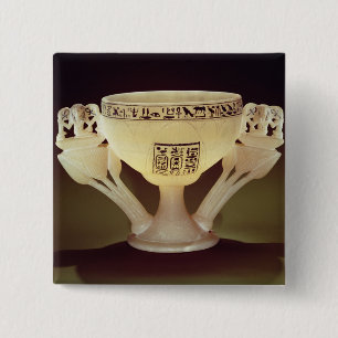 Drinking cup in the form of a half-opened 2 inch square button