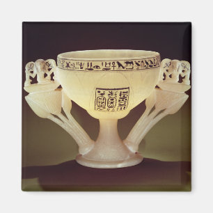Drinking cup in the form of a half-opened magnet